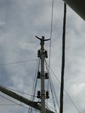 Standing on top of the mast of Tenacious