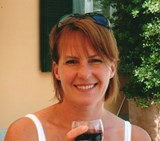 Susan and her customary glass of wine!